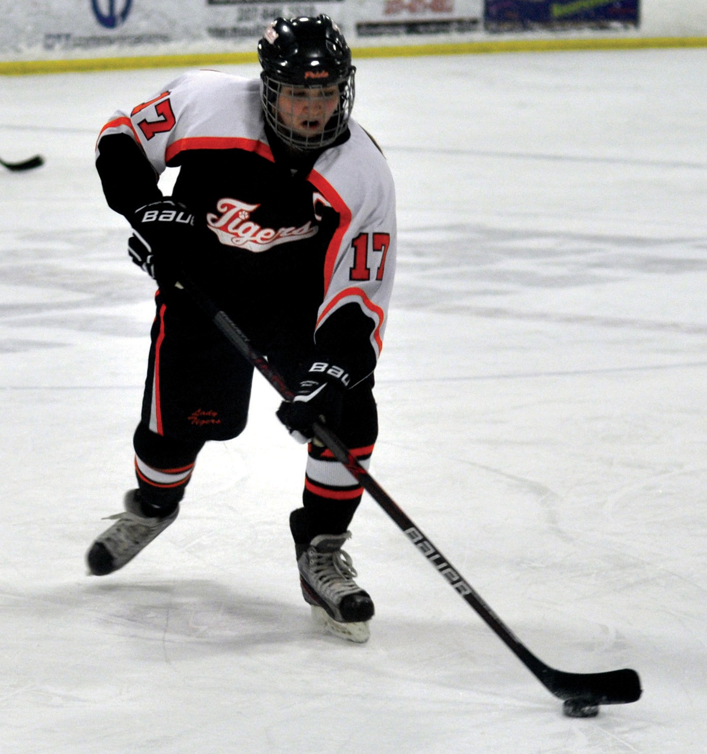 Biddeford’s Suzette Lamoureux carries the puck down the ice during Wednesday’s playoff game.