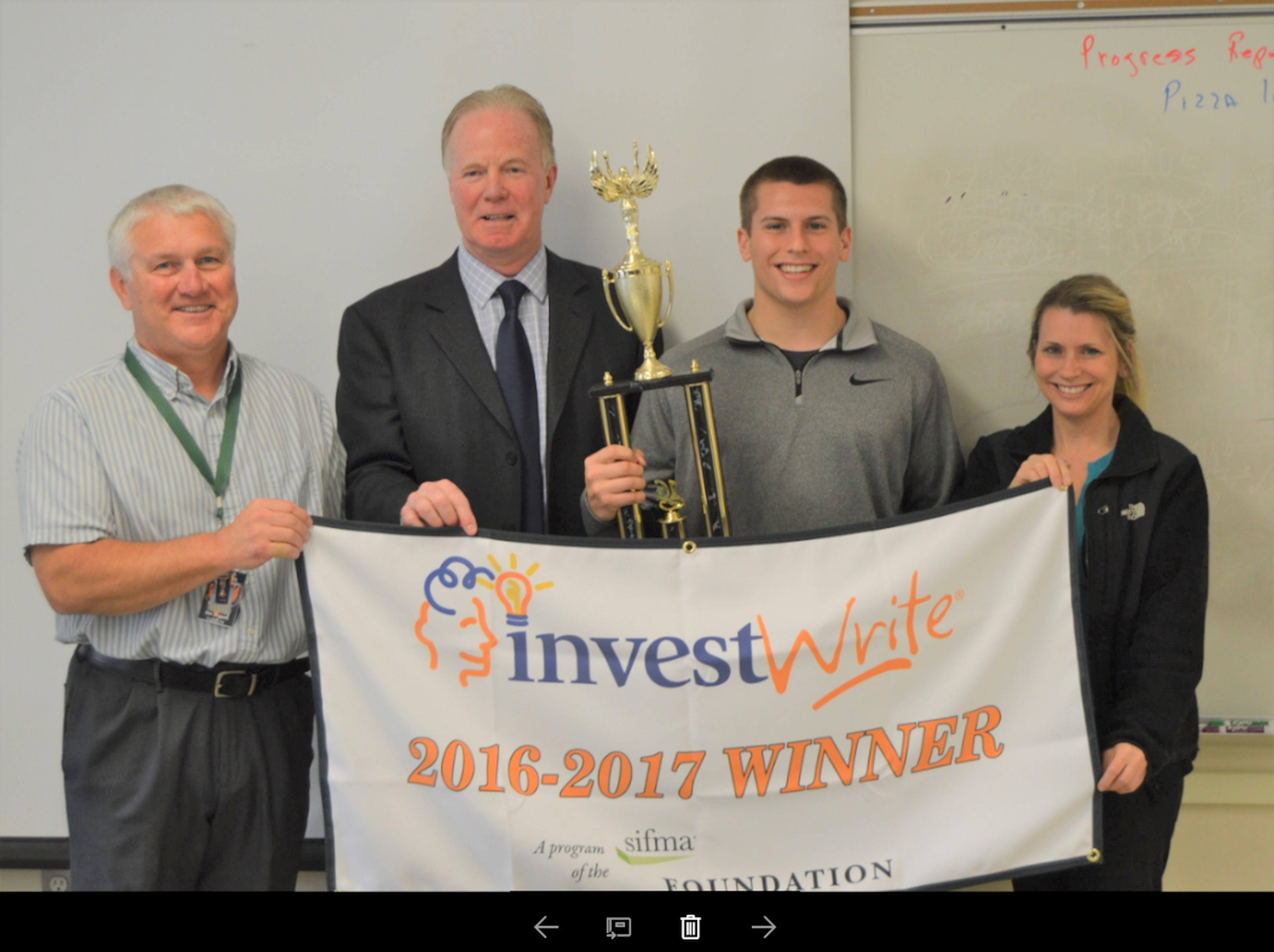 Austin Dutremble, a senior at Biddeford Regional Center of Technology and Biddeford High School, was named the state winner of the SIFMA Foundation’s Fall 2016 InvestWrite® essay competition. From left are BRCOT Instructor Ken Crepeau, ME/NH Coordinator for InvestWrite Jim Ford, BHS Senior Austin Dutremble and his mother Tracy Dutremble. SUBMITTED PHOTO