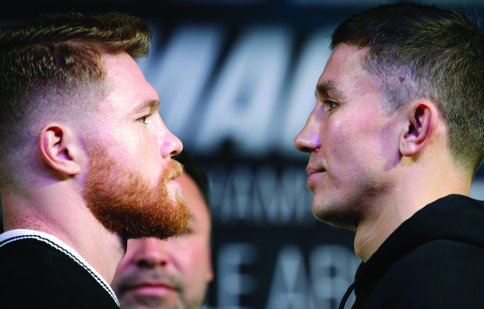 Canelo Alvarez, left, and Gennady Golovkin pose for photographers during a news conference Wednesday. The two are scheduled to fight in a middleweight title fight Saturday in Las Vegas. AP NEWSWIRE