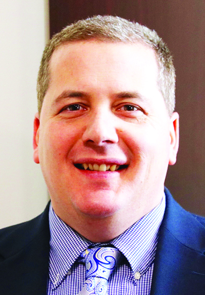 Greg Zinser, who became York County Manager in October 2011, has signed on for five more years, inking a new contract with York County Commissioners last week. TAMMY WELLS/Journal Tribune