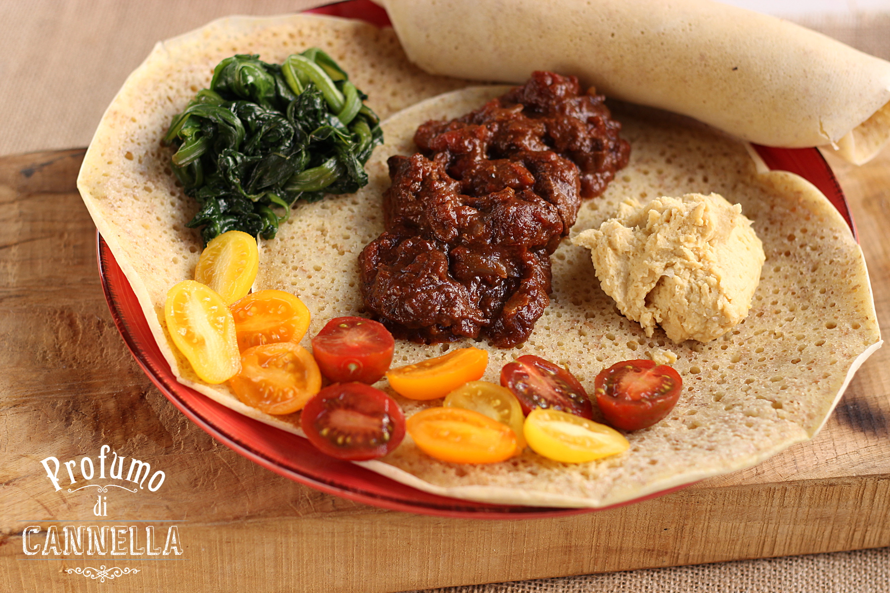 zighin-etiope-con-pane-injera-legumi-e-verdure-raffaella-caucci