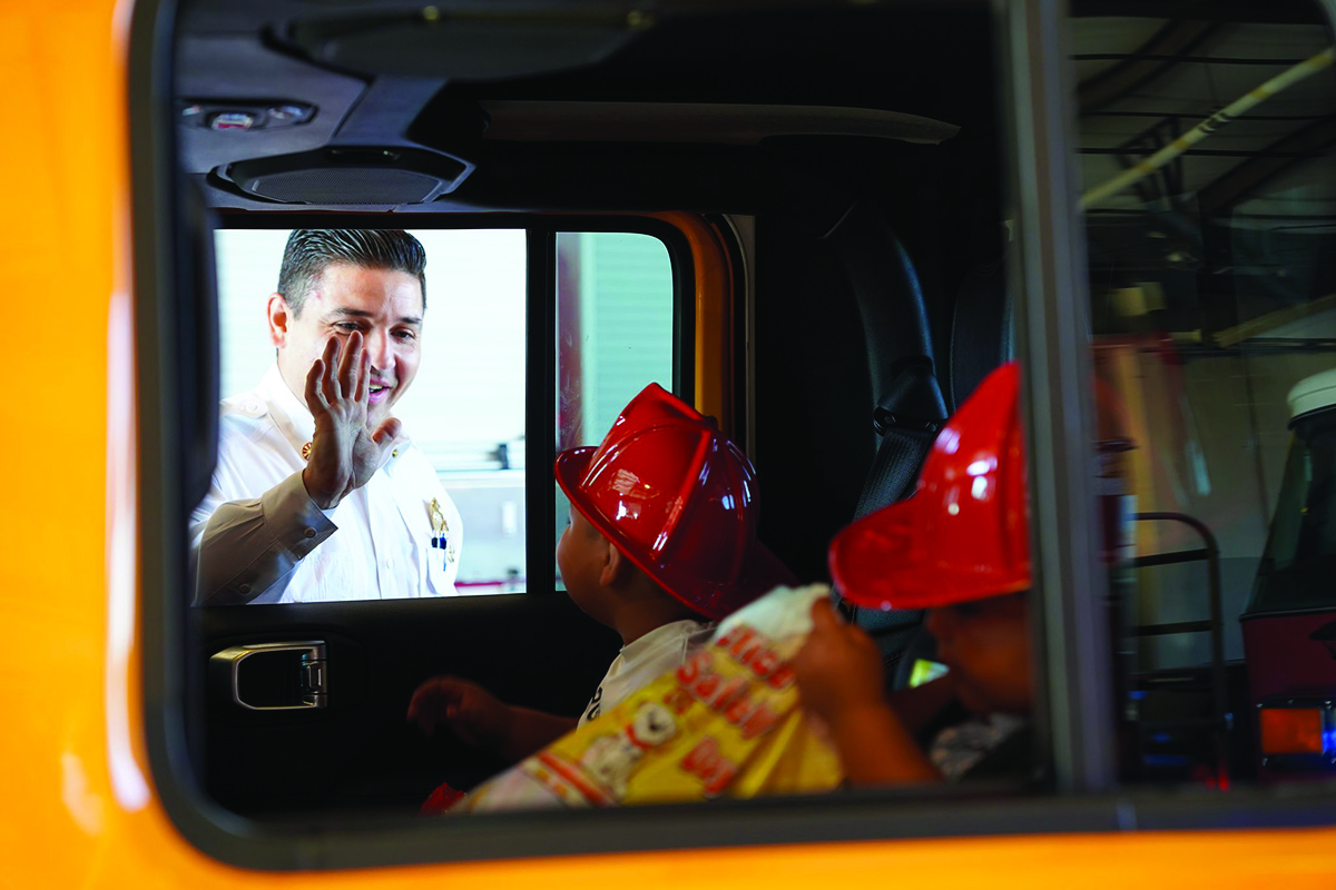 Alton Fire Department hosts drivethru for Fire Prevention Week Sparky