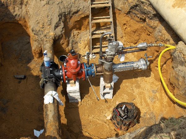 Pro Tapping & Pipe Freezing Wet Tap with mechanical joint tapping