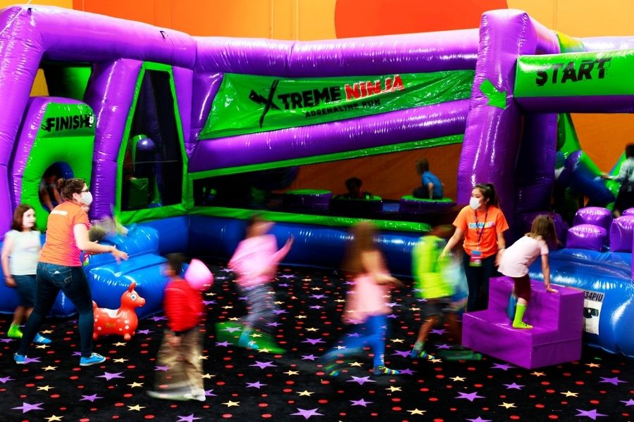 Inflatable for Rent vs. Indoor Inflatable Event Pump It Up