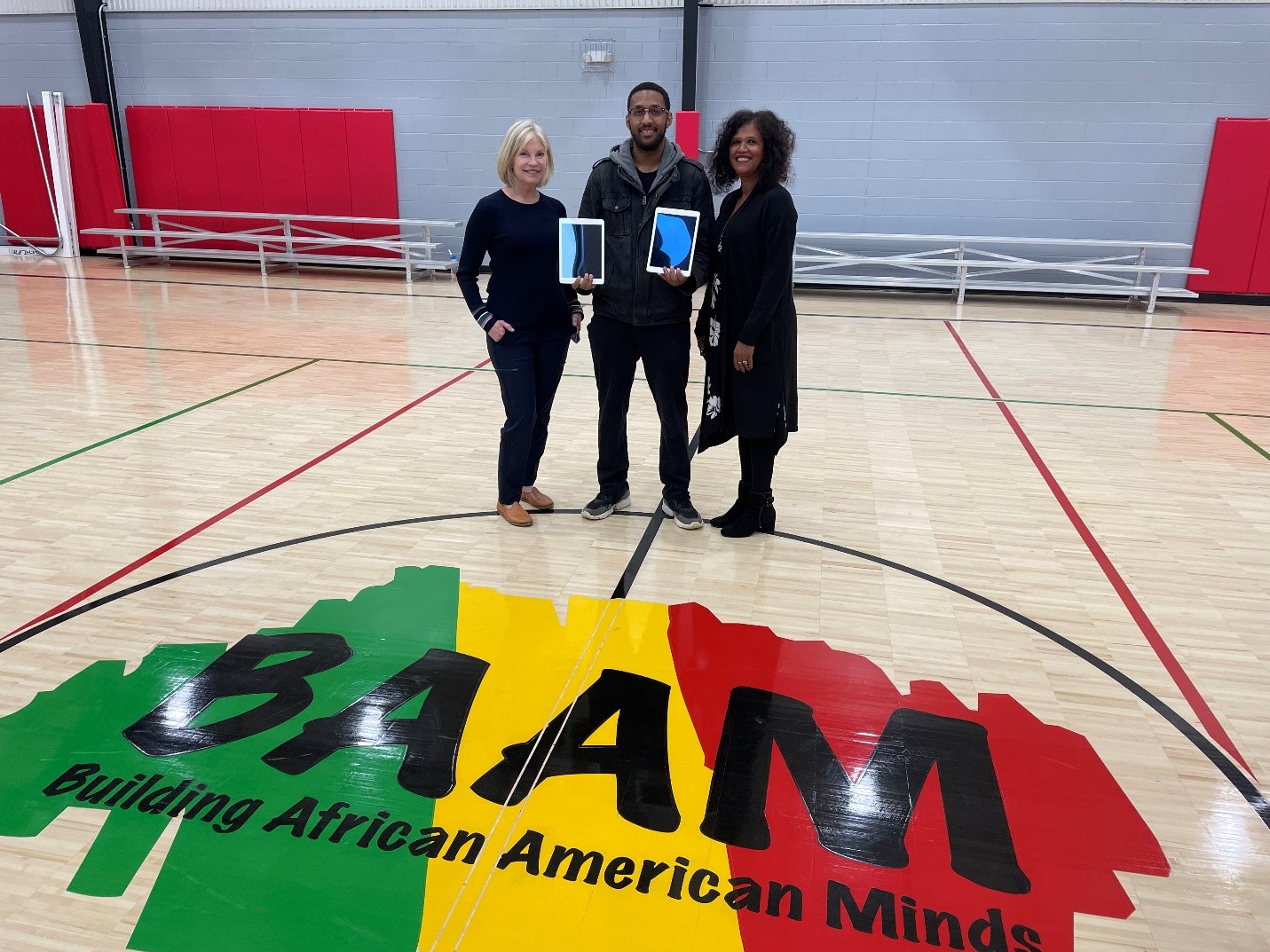 Qlarant Donates iPads to BAAM Qlarant