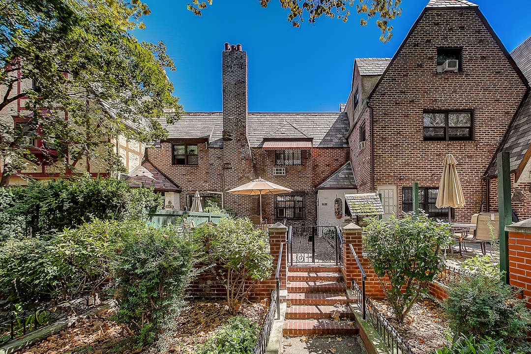 JUST LISTED All Brick English Garden Tudor in Jackson Heights! Top