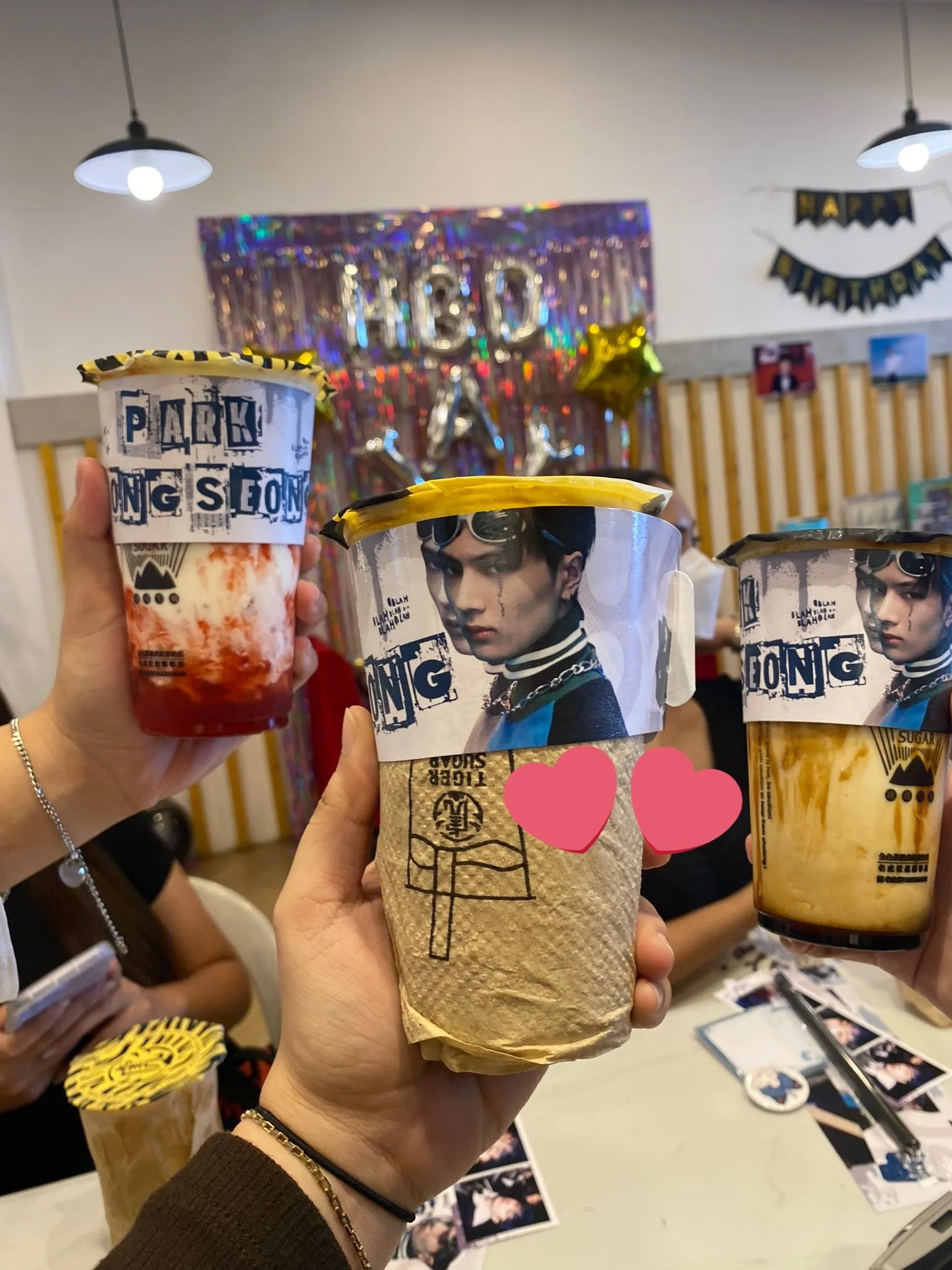 At the party, cheers! Meet the fans behind your local Kpop cupsleeve events