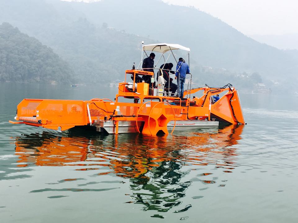 Aquatic plant harvesting machine in Phewa Lake