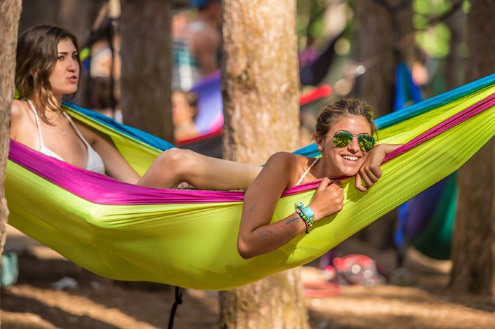 Electric Forest Introduces a Group Camp for Women Red Roll