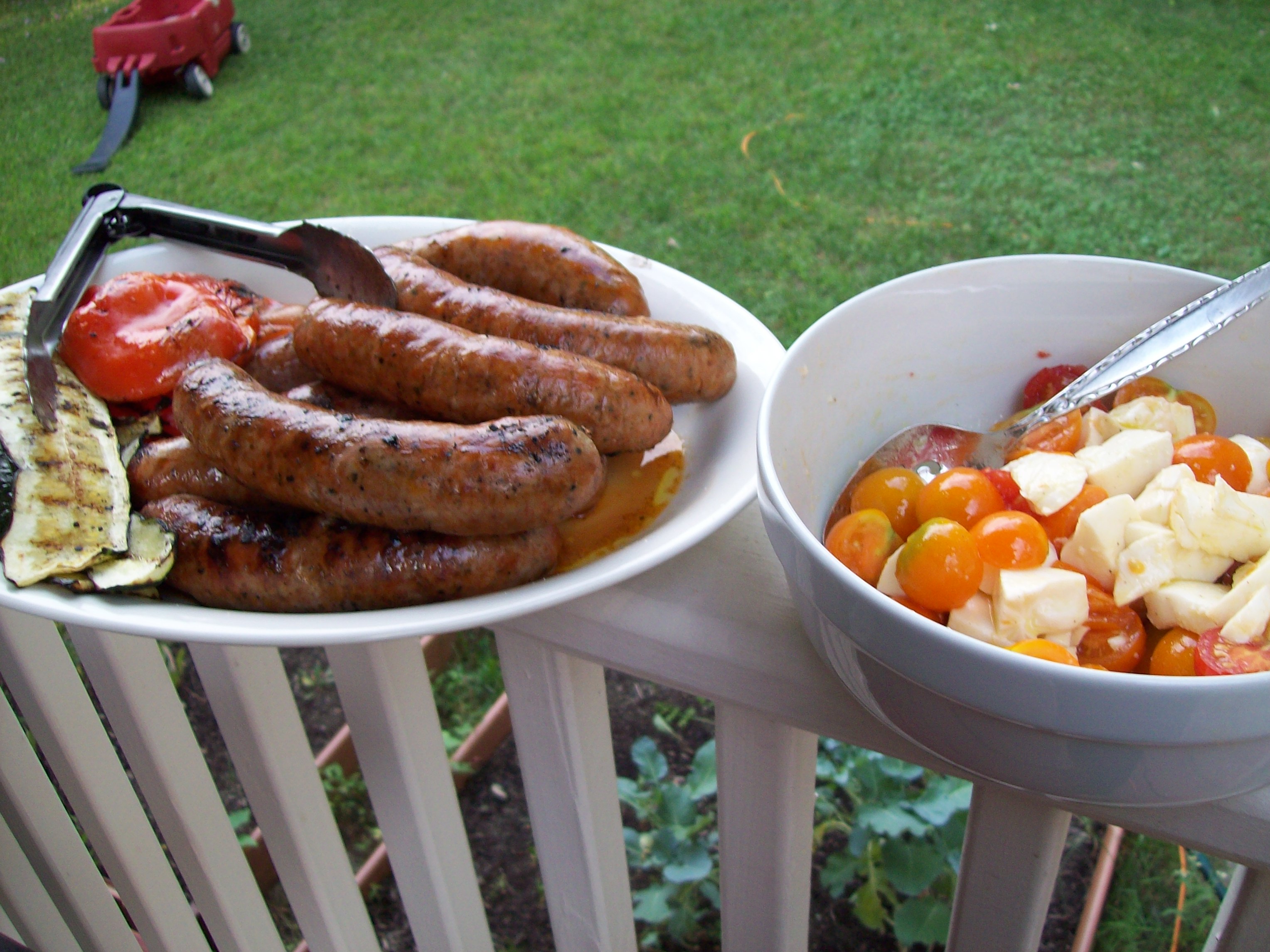 Grilled Sausages and Vegetables with Caprese Chopped Salad Red, Round
