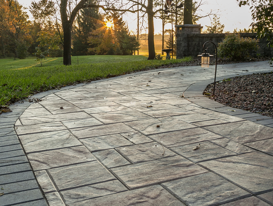 How to Choose Between Pavers or Concrete for Your Next Patio News Article