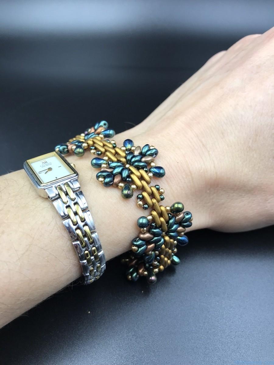 Learn how to create dangling beaded bracelets made from tigertail glass beads and wire, from diy network. Handmade Beaded Bracelet Star Bracelet Bead-Weaving Green