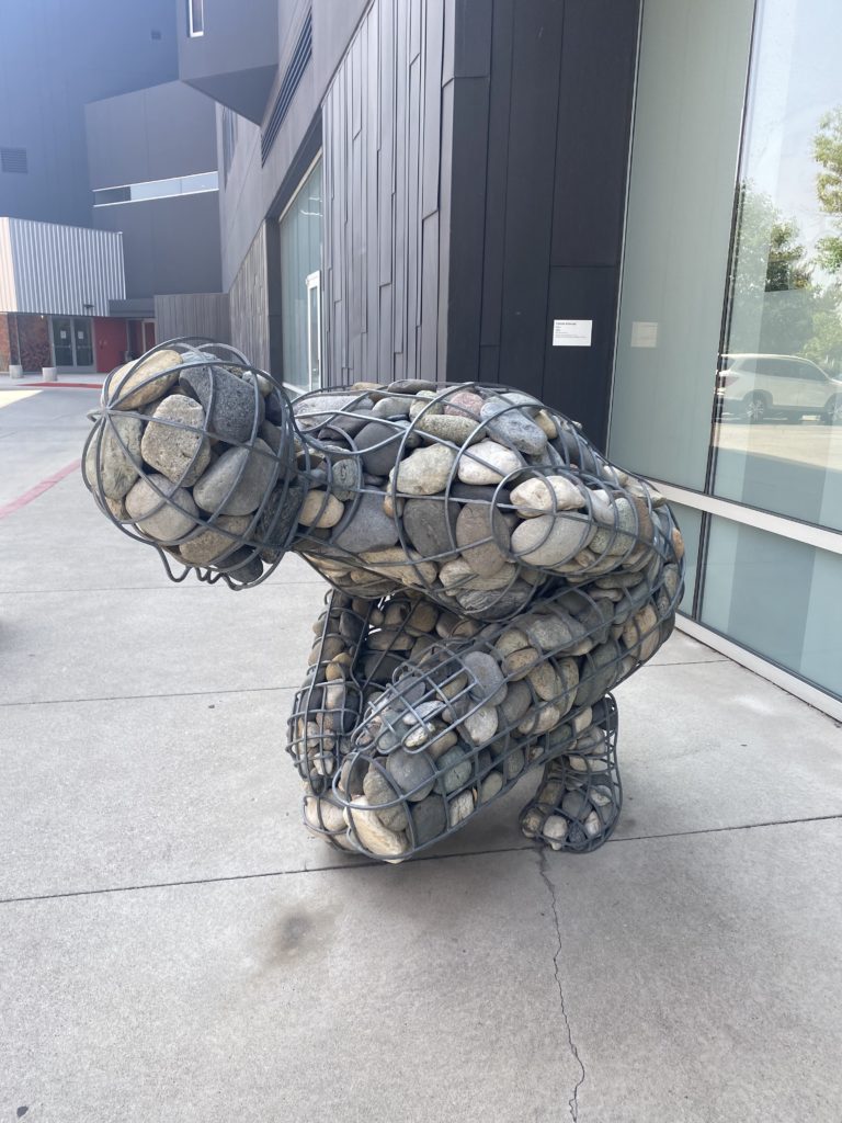 Cairn (The Weight of Grief) The Riverwalk District