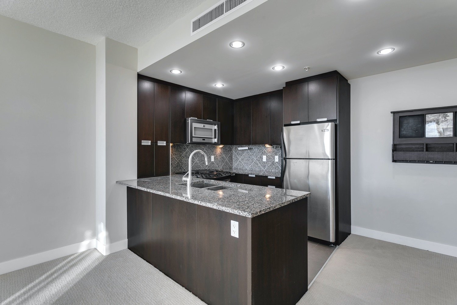 99 Spruce Place SW Unit 403 REP Calgary Homes