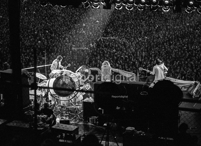Reportage photo of The Who playing at Charlton football ground 1976 (L