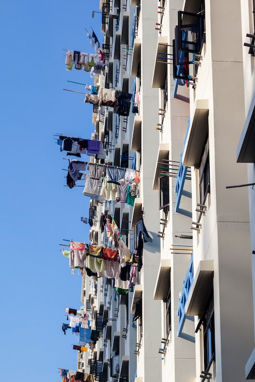 Drying Laundry Using Bamboo Pole SG