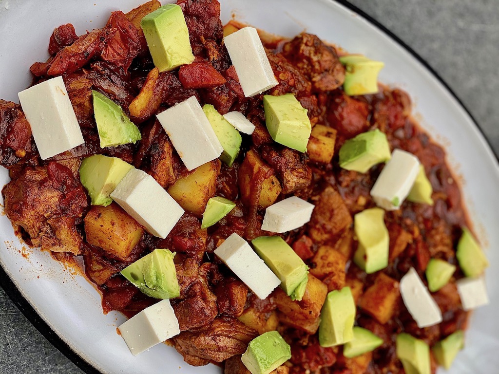 Braised Pork Shoulder with Roasted Tomatoes, Caramelized Onions