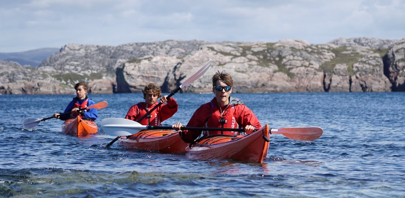 Blue team sea kayak expeditions and Reds head to survival island