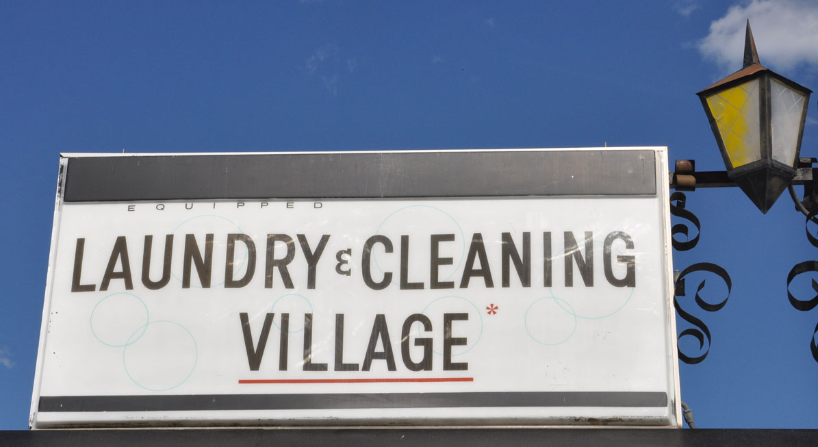Village Laundry & Dry Cleaning Ball" Signs