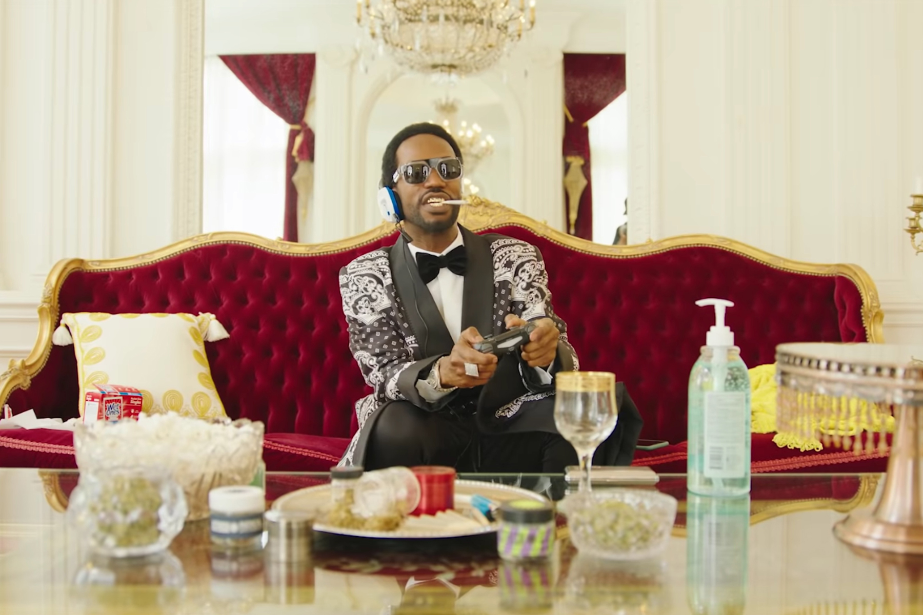 Juicy J Gets Baked, Bakes Bread In Quarantine In 'Gah Damn High' Video