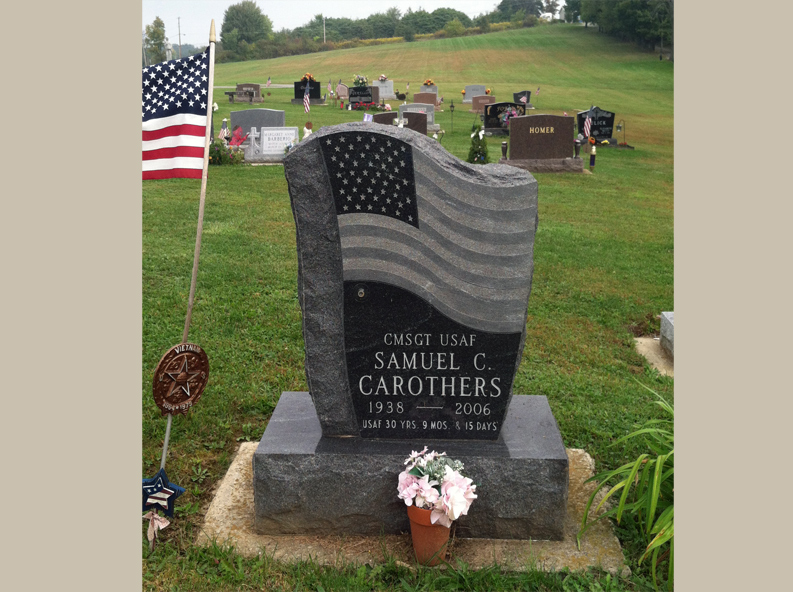U.S. Military Veteran Headstone With American Flag Etching