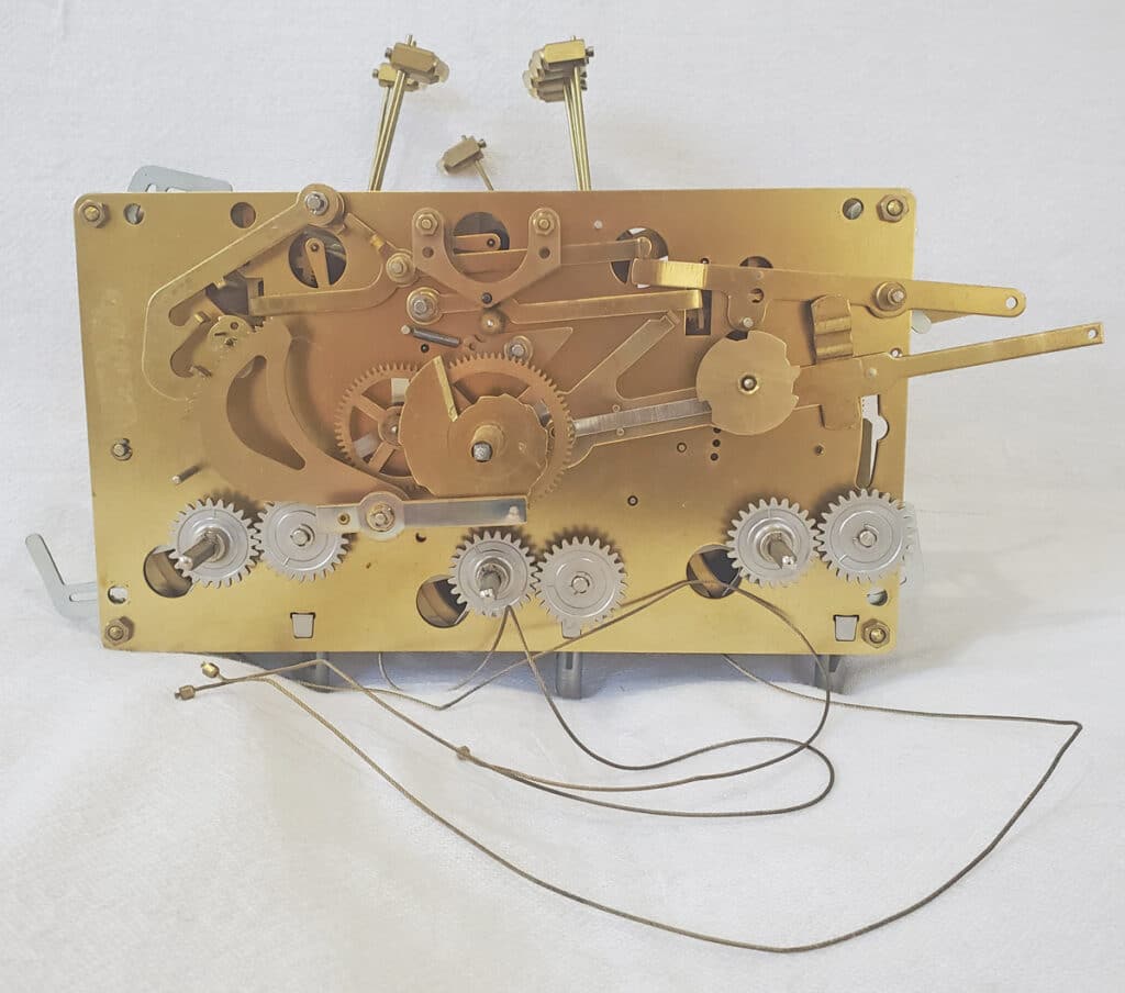 Urgos Triple Chime Grandfather Movement Ronell Clock Co.