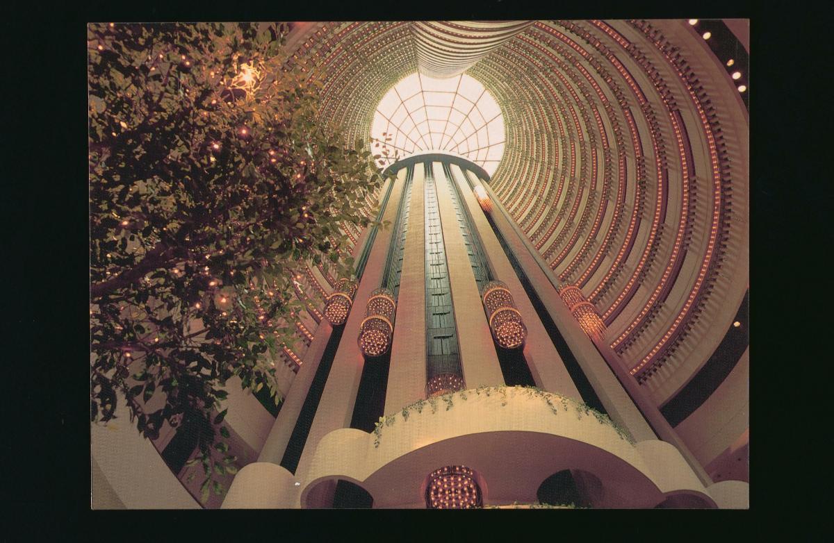 The lobby of the Glass Hotel at the junction of Havelock and Outram Roads