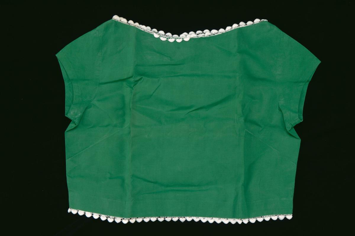 Green sleeveless top with white trimmings