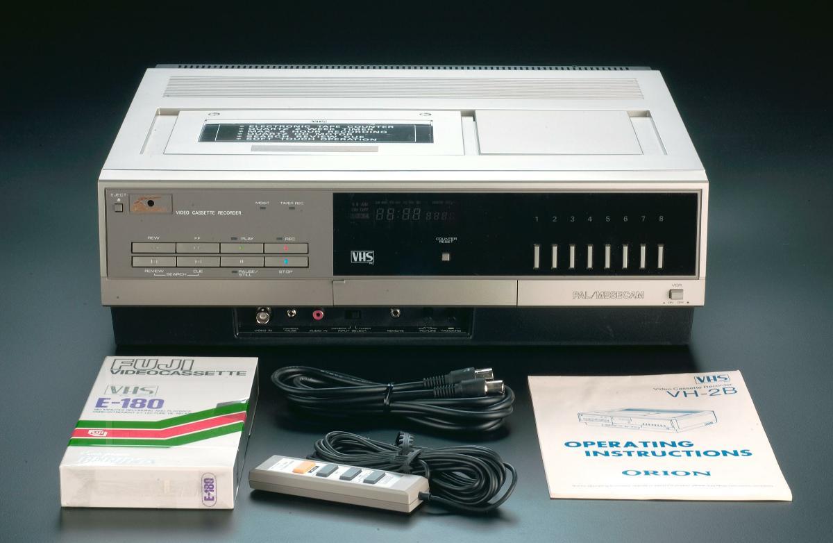 Orion video cassette recorder and Fuji VHS video cassette from "25