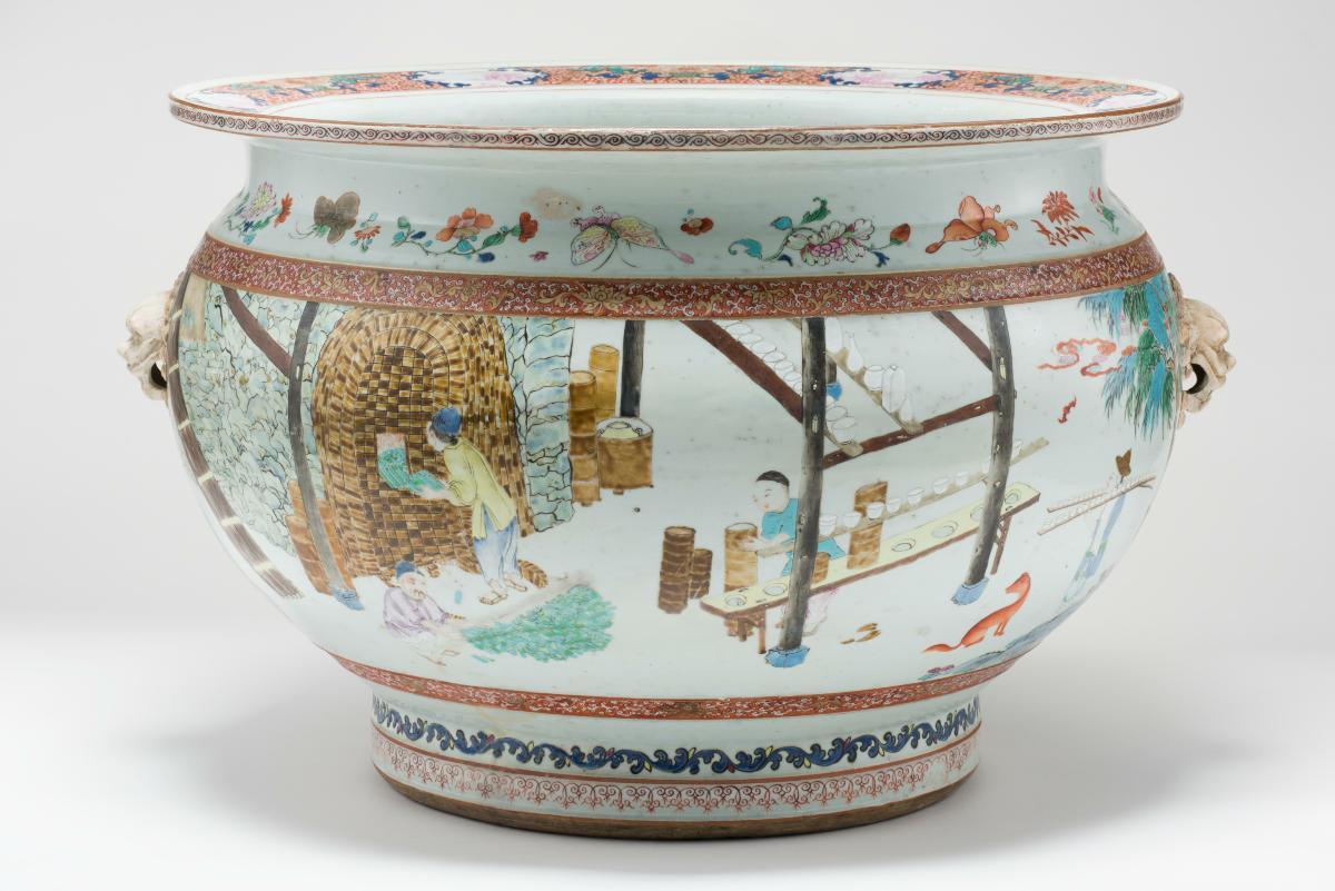 Large porcelain fish tank depicting the making of porcelain