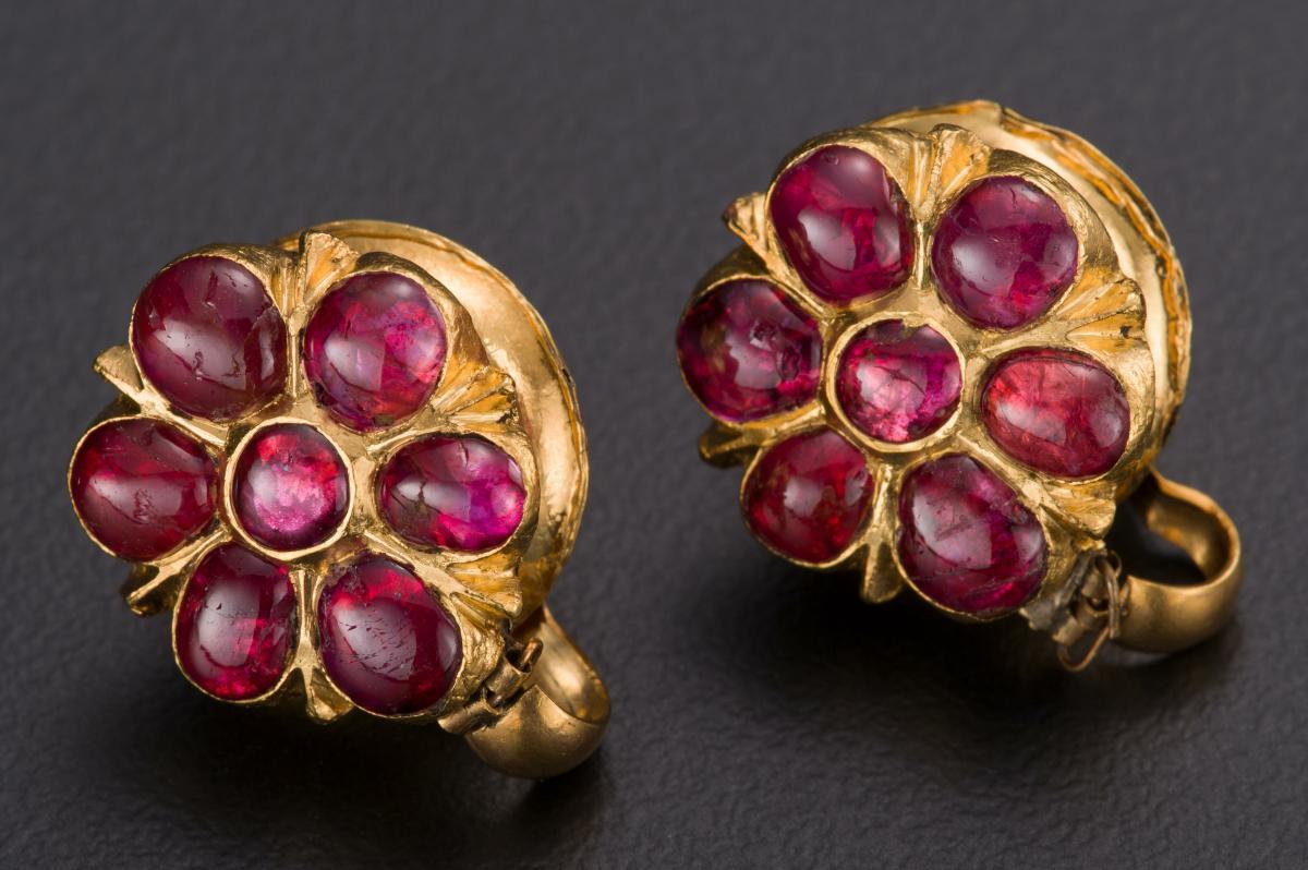 A pair of gold sheet Ear Ornaments (Thandatti). Bonhams Indians and