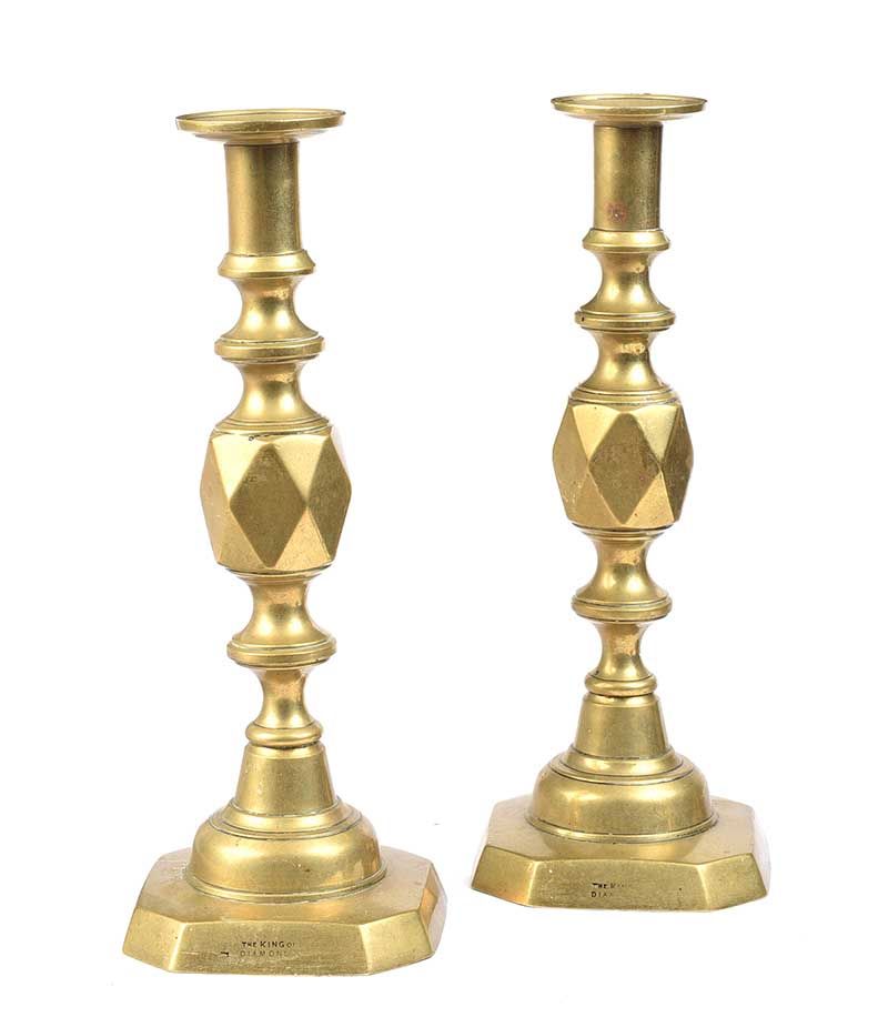 SET OF FOUR BRASS CANDLESTICKS