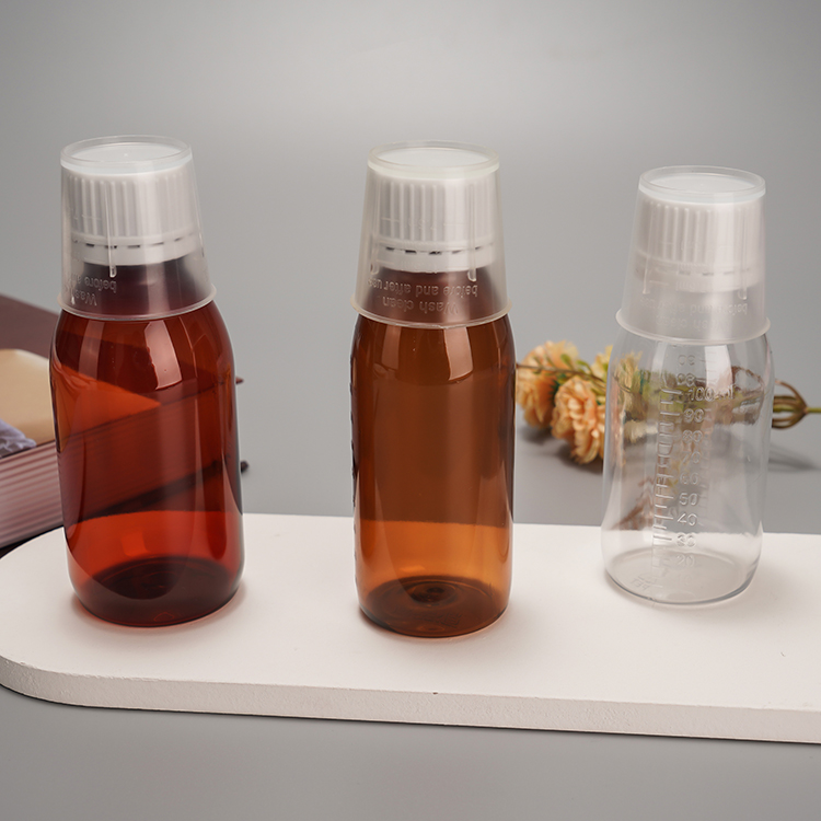 Wholesale Amber/Clear Plastic Bottles with Measuring Cup for Liquid
