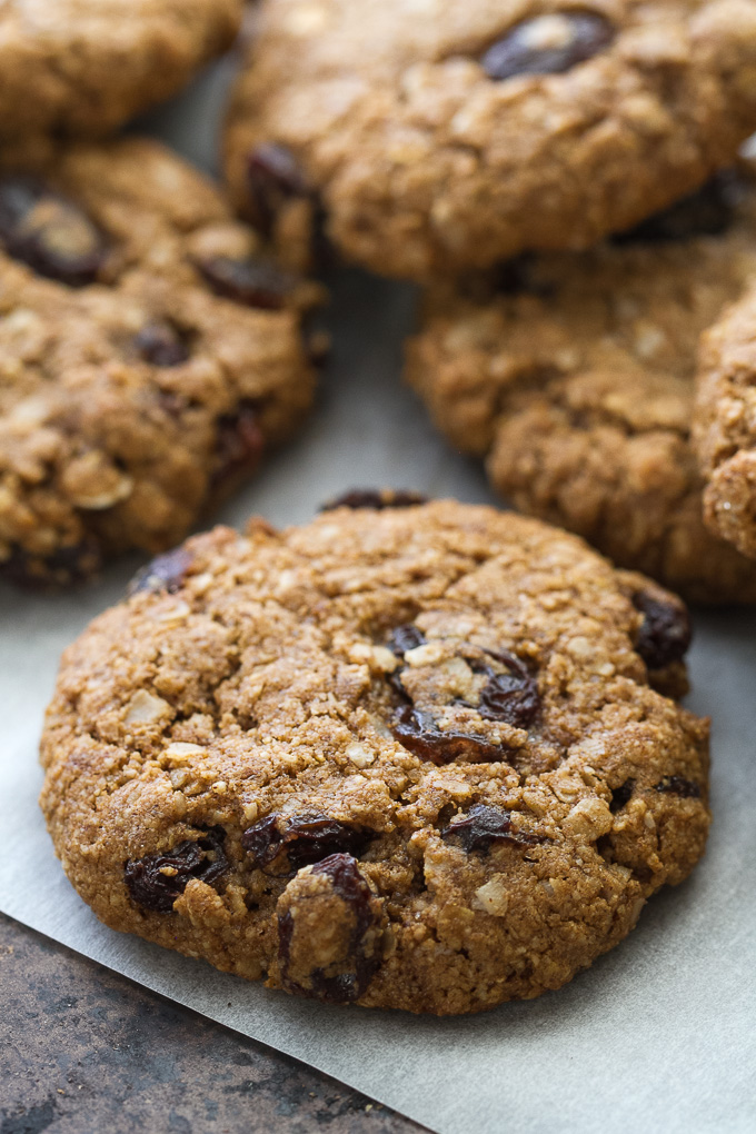 Soft & Chewy Flourless Oatmeal Raisin Cookies running with spoons