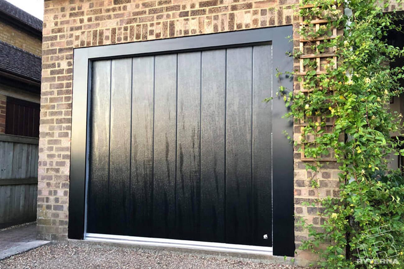 Side sliding garage doors