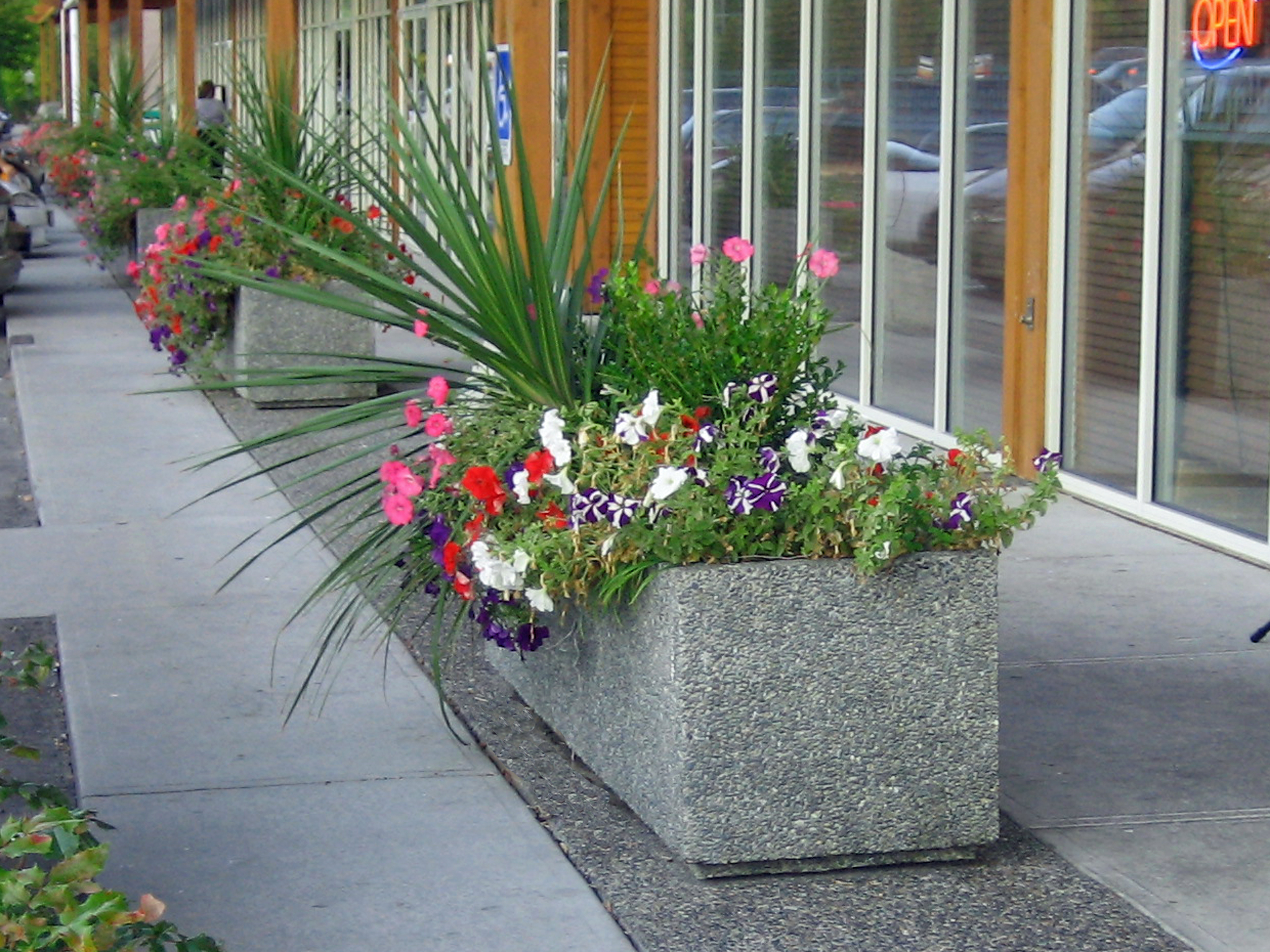 large rectangular precast concrete exposed aggregate security barrier