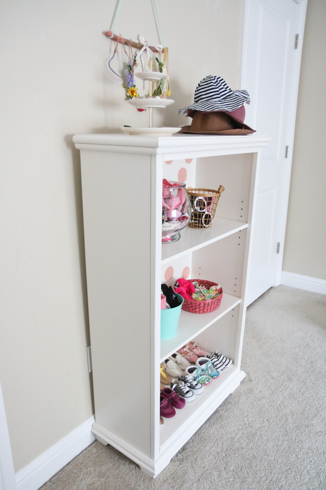DownEast Home Bookcase turned into DIY Baby Girl's Accessory Holder