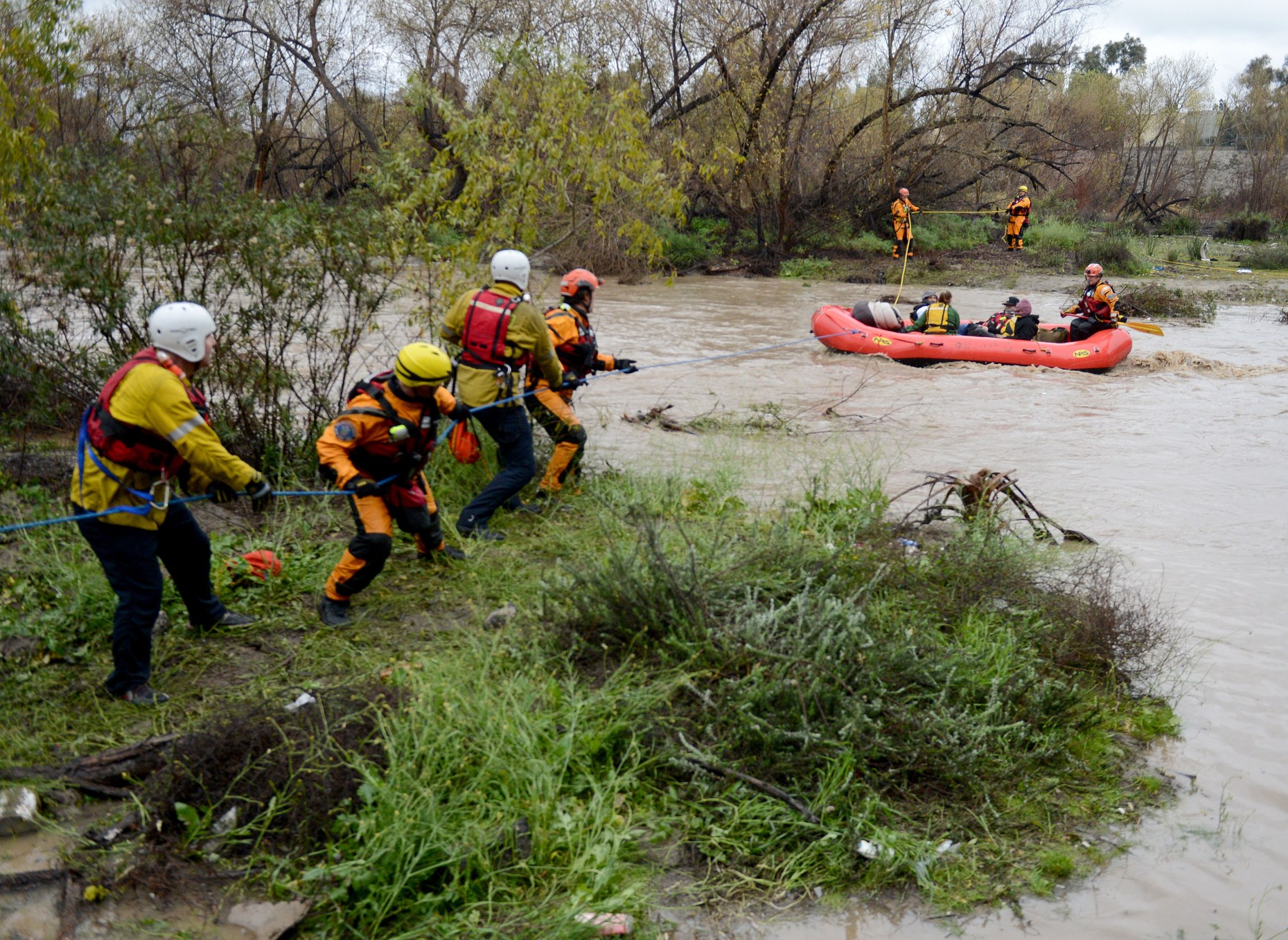 5 people rescued from Santa Ana River flood waters in San Bernardino