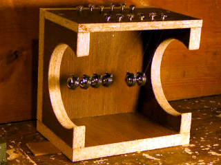 wooden newtons cradle