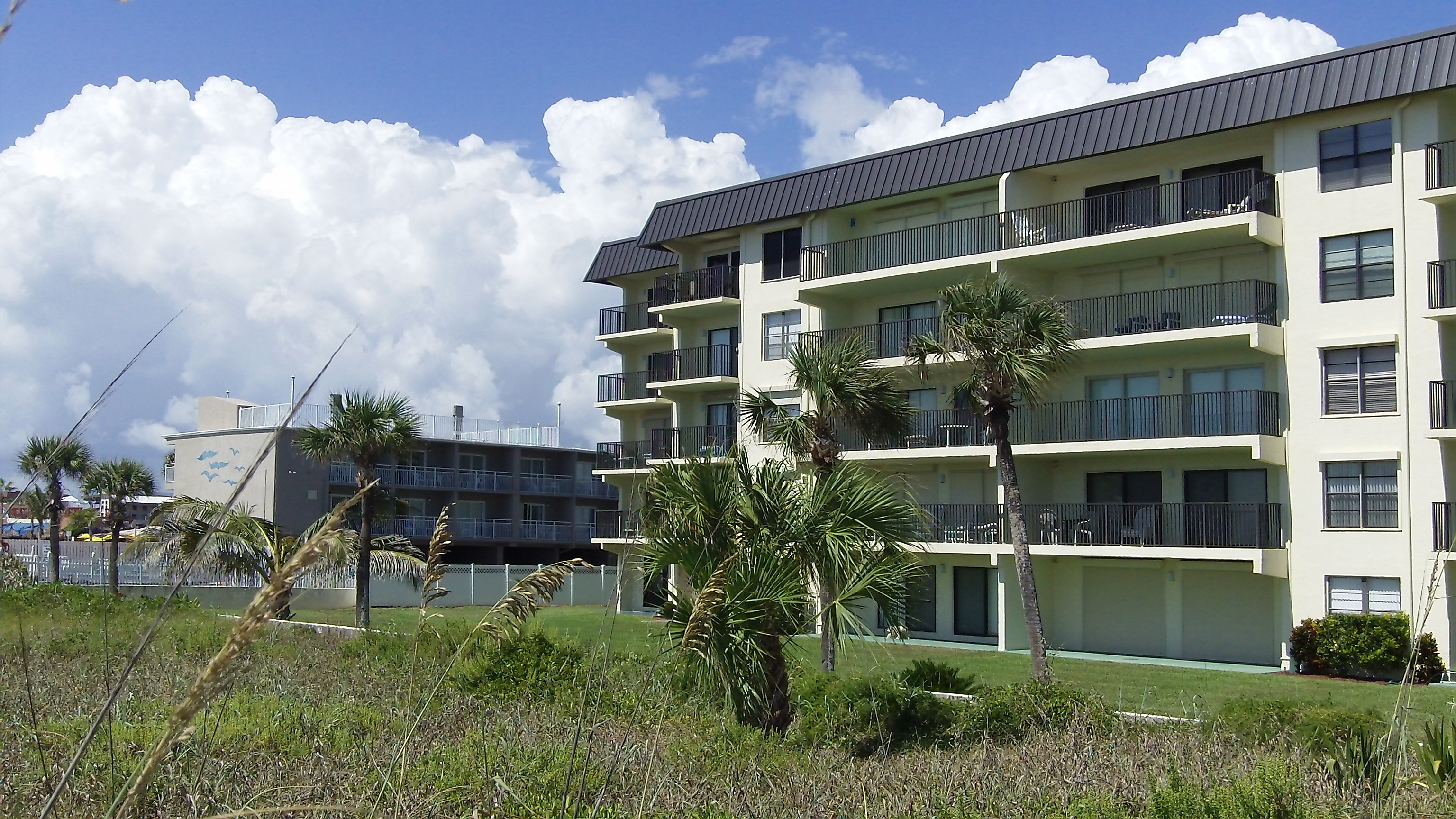 Condo from the walkway to the beach to Sea Oats Cocoa Beach