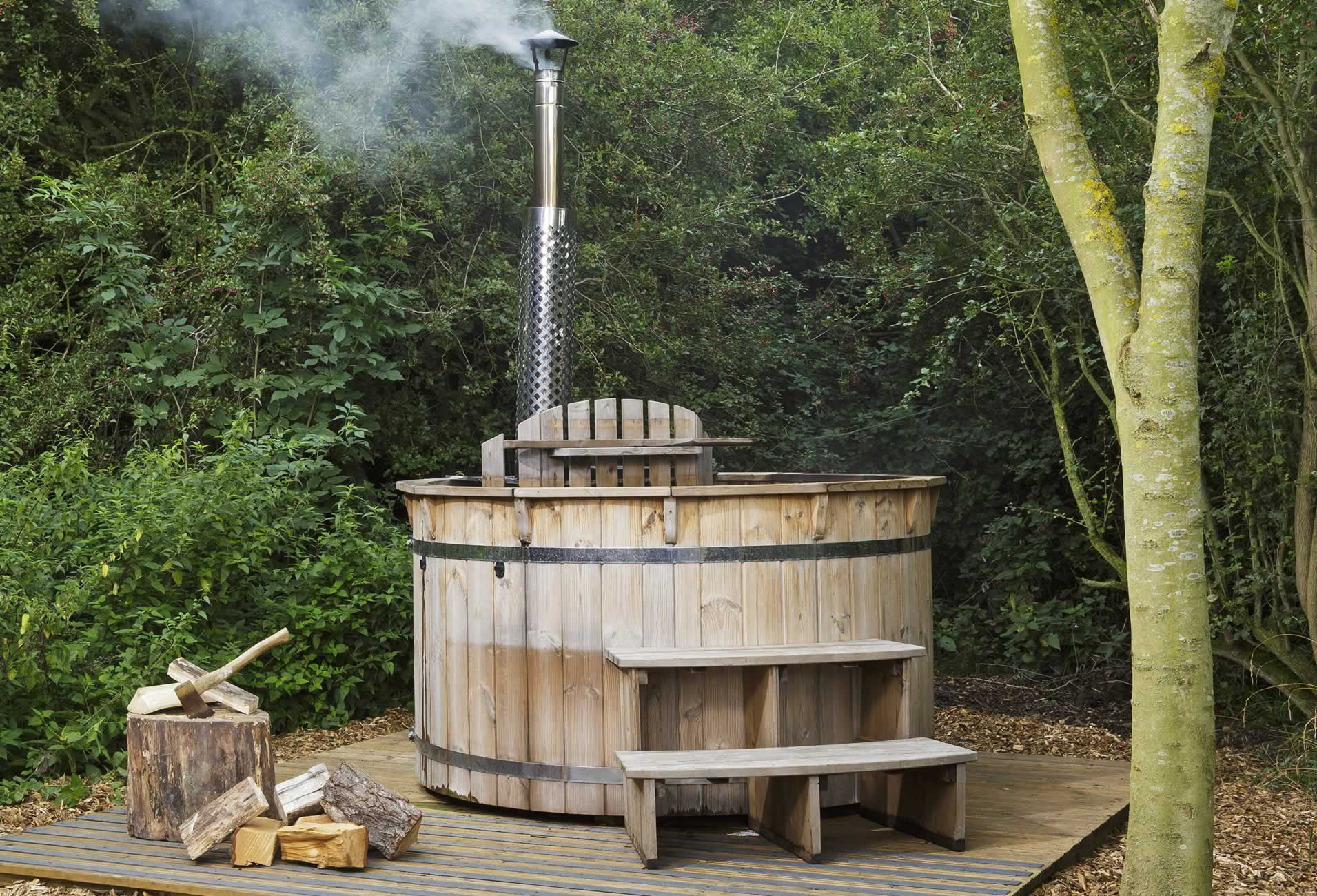 Hot tub hire at Secret Meadows glamping site UK.