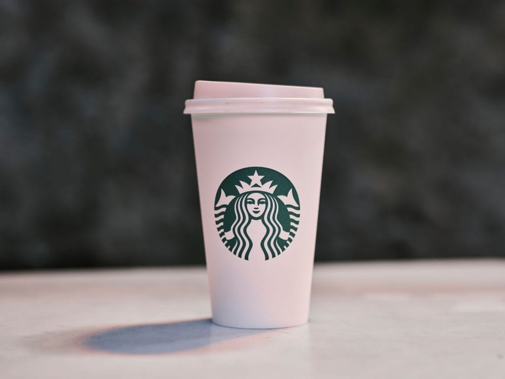 Famous Starbucks Logo Meaning (Story, Origin & Rebranding)