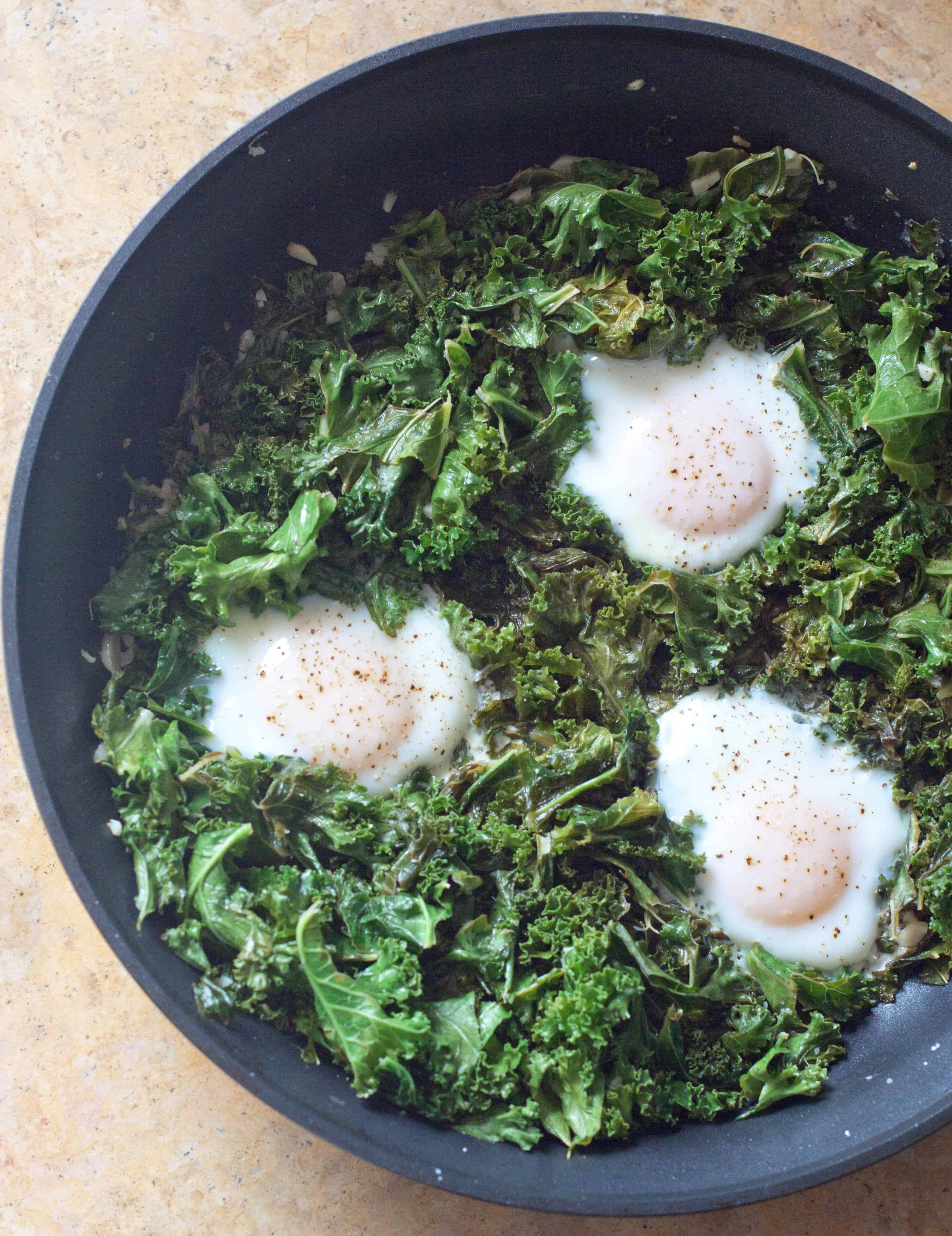 Simmered Eggs and Kale Served From Scratch