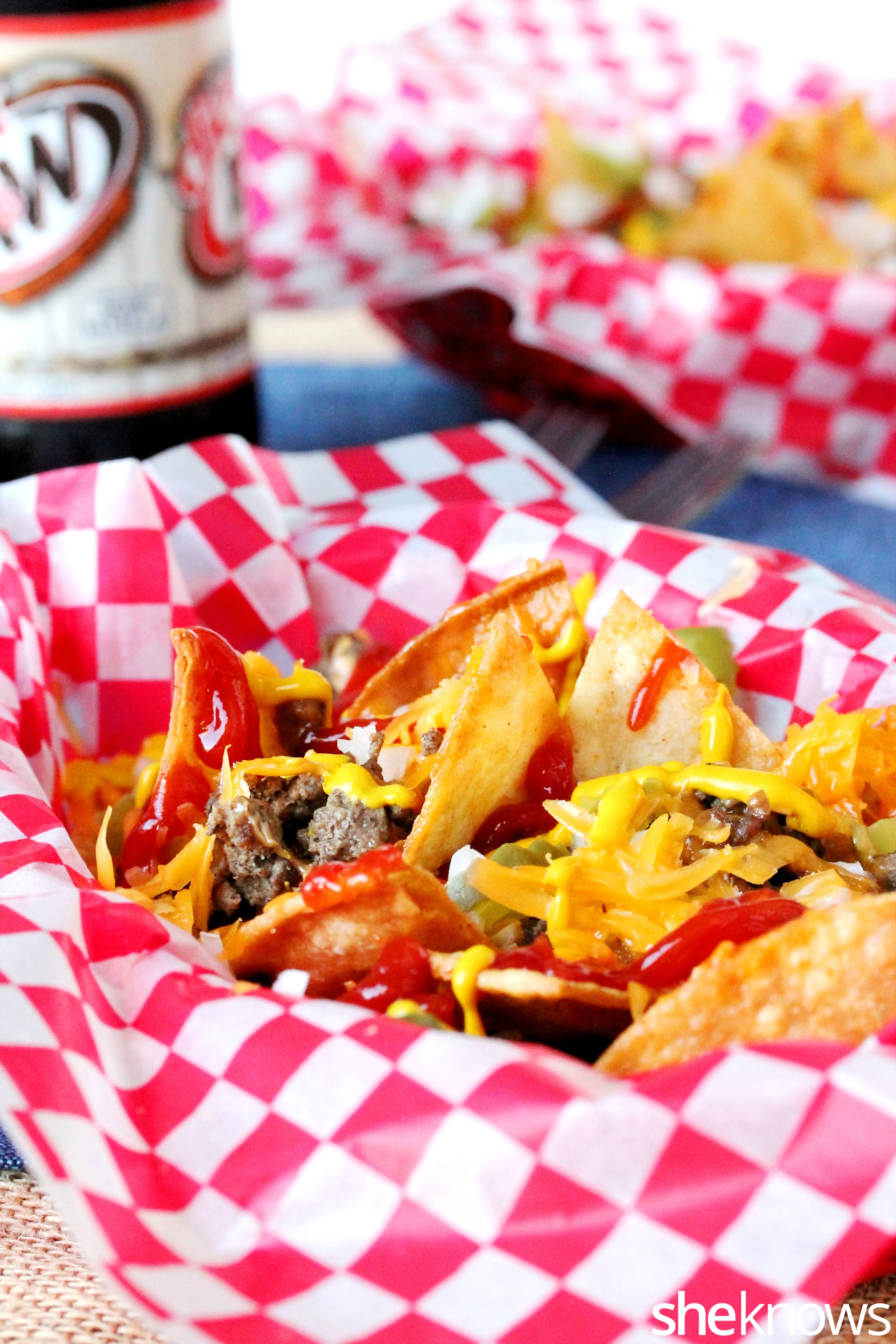 Cheeseburgers and chips collide to form the ultimate nachos SheKnows