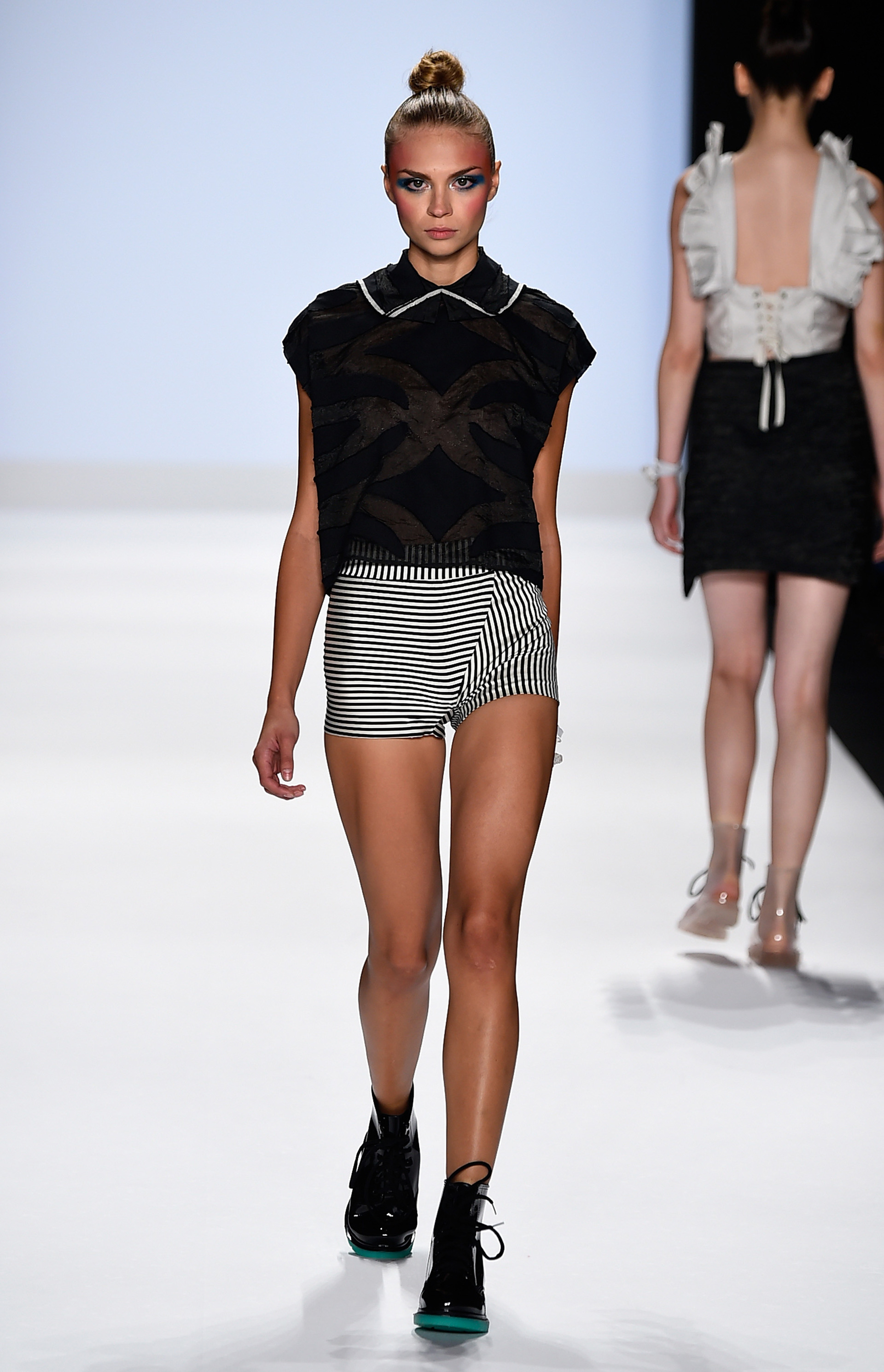 Spoiler alert Couture looks from the Project Runway Fashion Week show