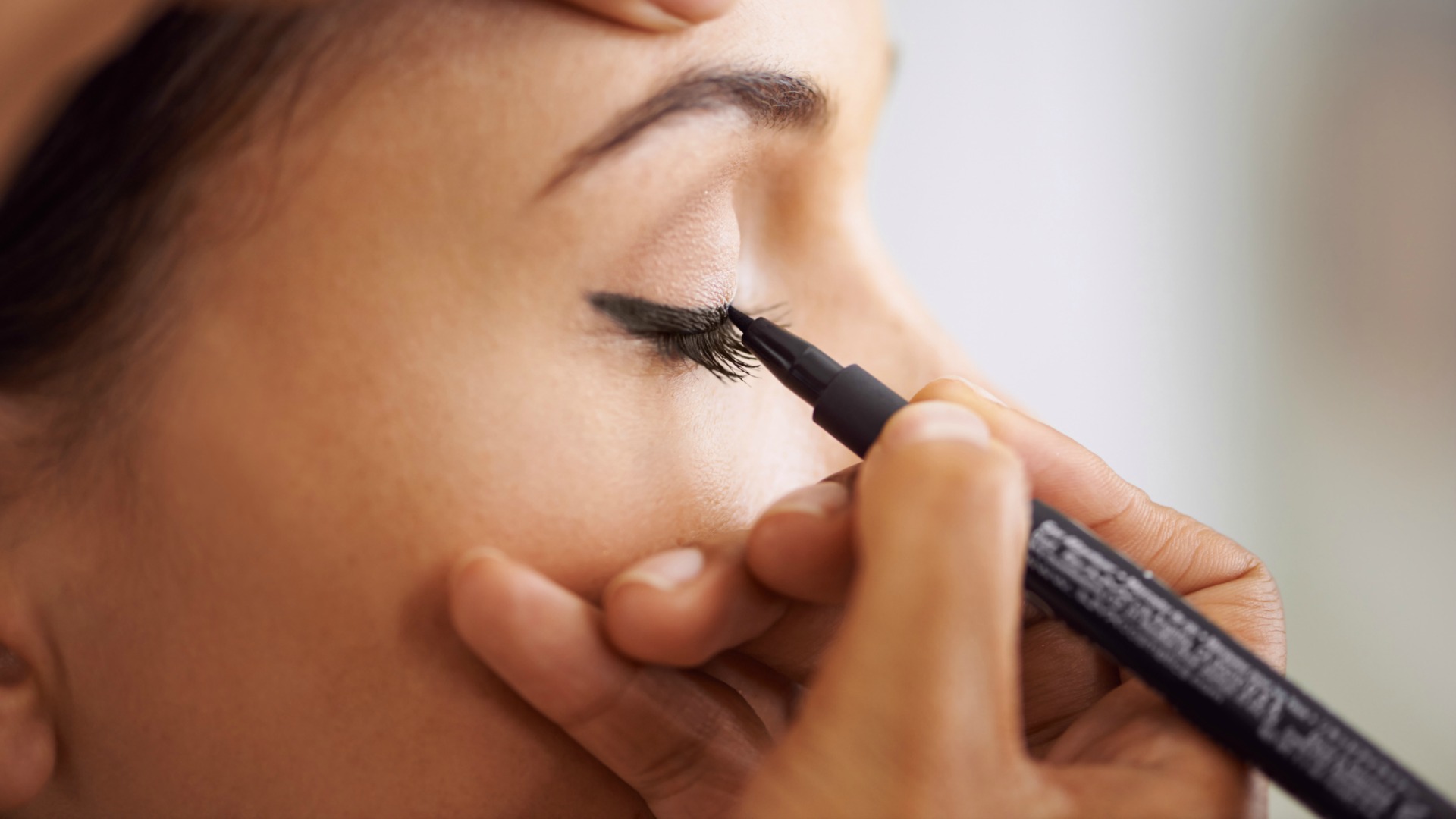 Learn how to apply liquid eyeliner like a pro