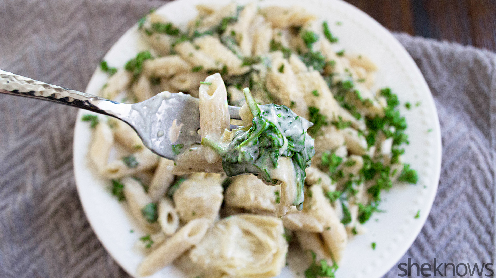 Slow Cooker Sunday Spinachartichoke mac and cheese is dip turned dinner