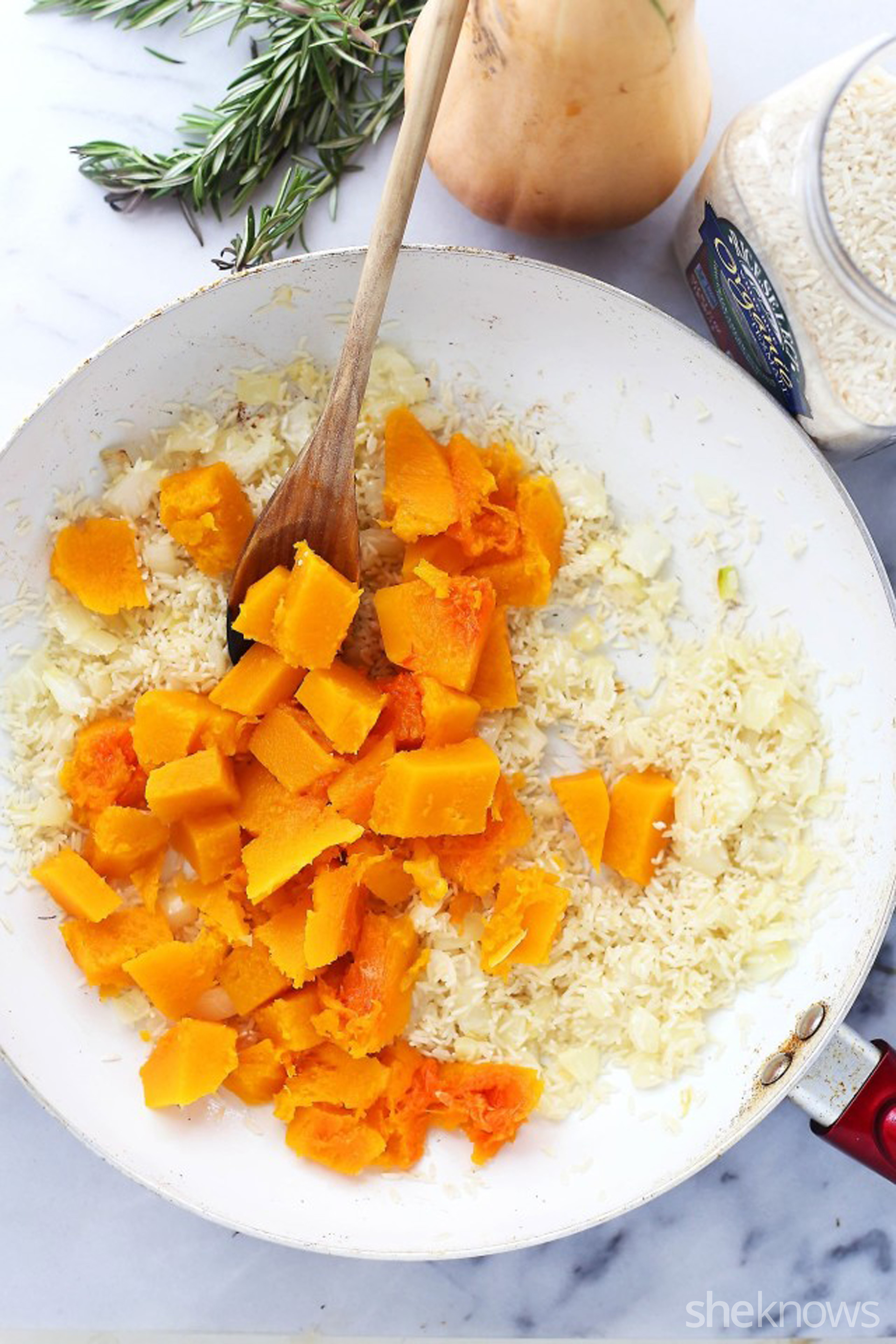 Hearty butternut squash rice casserole is vegetarian fall