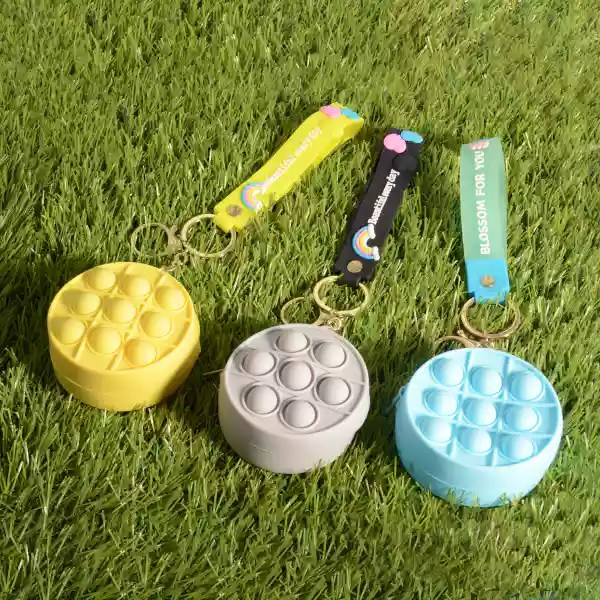 Popit Keychain with Coin Purse Function Custom Keychain Manufacturer