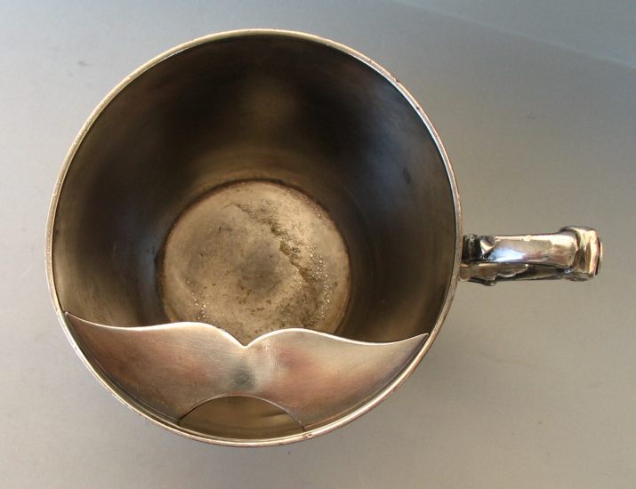 a silverplate moustache cup from a small collection of antique silver